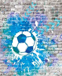 Samolepící tapety Samolepící tapeta modrý fotbalový míč na cihlové zdi