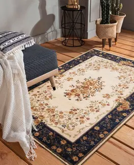 Vintage koberce Kvalitní krémově modrý koberec s motivem květin