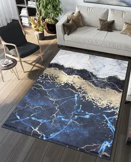 Moderní koberce Modrý módní koberec s abstraktním vzorem Šířka: 160 cm | Délka: 230 cm