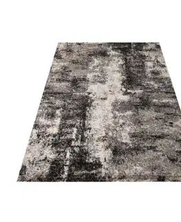 Moderní koberce Brilatní béžově hnědý koberec s jemným abstraktním motivem