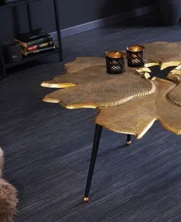 Designové a luxusní konferenční stolky Estila Art deco konferenční stolek Ginko zlaté barvy ve tvaru listů s černými nožičkami z kovu 90cm