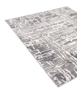 Moderní koberce Šedý designový koberec se světlým abstraktním vzorem