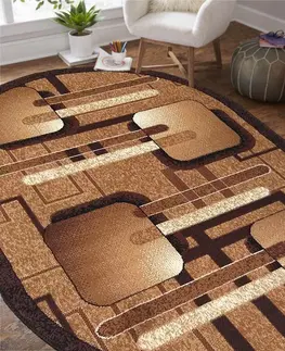 Kulaté a oválné koberce Oválný koberec v hnědé barvě s geometrickými vzory