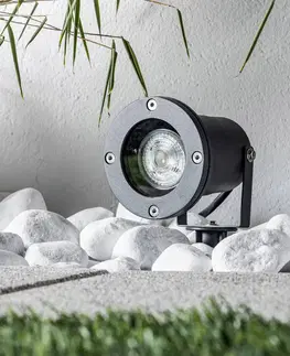 Zemní svítidlo s bodcem Lindby Tessa – venkovní reflektor s kolíkem v šedé barvě