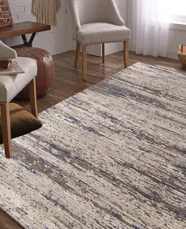 Moderní koberce Moderní koberec v béžovo-hnědé barvě s modrým detailem Šířka: 200 cm | Délka: 290 cm