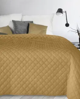 Jednobarevné přehozy na postel Stylový prošívaný přehoz hnědo žluté barvy