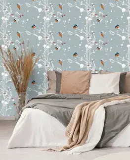 Samolepící tapety Samolepící tapeta ptáčci v hustém lese s modrým pozadím