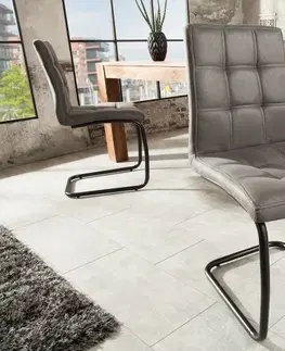 Luxusní jídelní židle Estila Industriální jídelní židle Naomy s kovovou černou konstrukcí a čalouněným prošívaným sezením 92cm