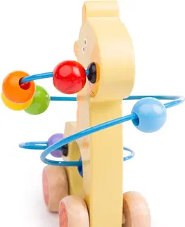 Dřevěné hračky Bigjigs Toys Labyrint na kolečkách GIRAFFE žlutý