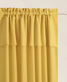 Jednobarevné hotové závěsy Hořčicově žlutý závěs MIA na stuhu 140 x 260 cm