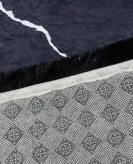 Moderní koberce Černý trendový koberec se zlatým geometrickým vzorem