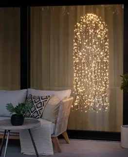 Vánoční světelné závěsy Konstsmide Christmas LED světelný závěs medúza 2 600K 900 LED 145x45cm