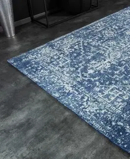 Designové a luxusní koberce Estila Obdélníkový vintage modrý koberec Mistal z hladké pevné žinylkové bavlny s bílým vzorem 160x230cm