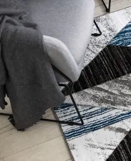 Koberce a koberečky Dywany Lusczow Kusový koberec ALTER Nano trojúhelníky modrý, velikost 80x150