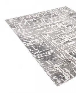 Moderní koberce Šedý designový koberec se světlým abstraktním vzorem Šířka: 140 cm | Délka: 200 cm