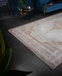 Designové a luxusní koberce Estila Orientální šedě-hnědý vzorovaný koberec Caubbar II s vintage efektem 350cm