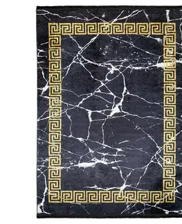 Moderní koberce Černý trendový koberec se zlatým geometrickým vzorem