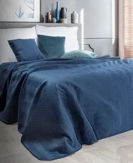 Luxusní oboustranné přehozy na postel Oboustranný prošívaný přehoz na postel v tmavě modré barvě