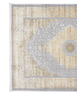 Moderní koberce Exkluzivní moderní šedý koberec se zlatým orientálním vzorem