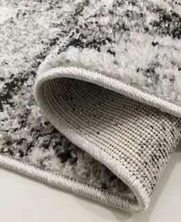 Moderní koberce Brilatní béžově hnědý koberec s jemným abstraktním motivem