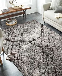 Moderní koberce Stylový hnědý koberec s motivem připomínajícím mramor Šířka: 80 cm | Délka: 150 cm