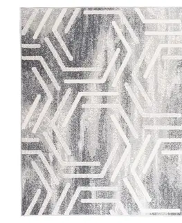 Moderní koberce Světlý designový koberec s geometrickým vzorem