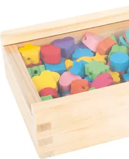 Dřevěné hračky Dřevěné navlékací korálky Small Foot: tvary