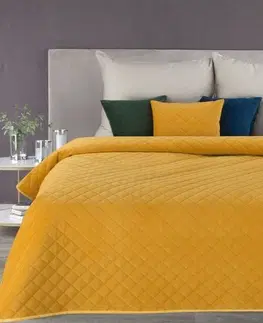Jednobarevné přehozy na postel Žlutý přehoz na postel s geometrickým vzorem