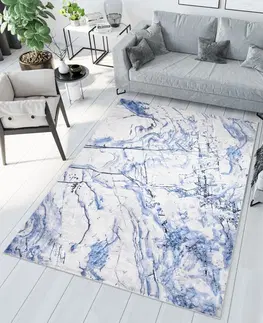 Moderní koberce Jednoduchý bílý a modrý koberec s abstraktním vzorem
