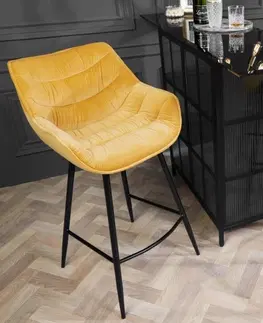 Luxusní barový nábytek Estila Industriální designová barová židle Kotor ve žlutém provedení se sametovým potahem a černou kovovou konstrukcí 105cm