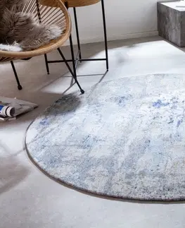 Designové a luxusní koberce Estila Orientální kulatý koberec Adassil s modrým vzorem 150cm