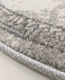 Kulaté a oválné koberce Stylový šedý kulatý koberec se vzorem mandaly