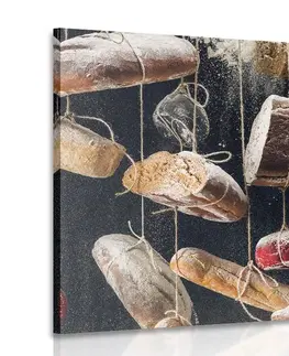 Obrazy jídla a nápoje Obraz visící pečivo na laně