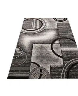 Moderní koberce Originální šedohnědý koberec s motivem abstraktních kruhů