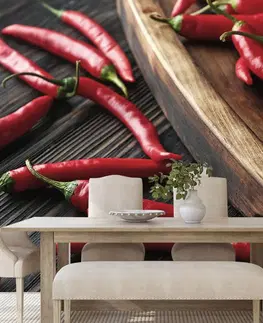 Samolepící tapety Samolepící fototapeta deska s chili papričkami