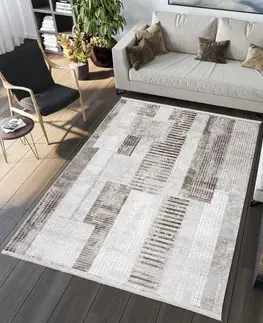 Vintage koberce Designový vintage koberec s geometrickými vzory v hnědých odstínech Šířka: 120 cm | Délka: 170 cm