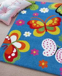 Dětské koberce Dětský koberec s motýlky v modré barvě