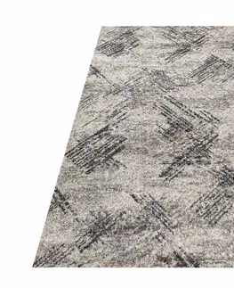 Moderní koberce Moderní béžový koberec s jemným vzorem
