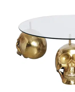 Designové a luxusní konferenční stolky Estila Designový kulatý konferenční stolek Hamlet se třemi nožičkami ve tvaru lebek ve zlaté barvě a skleněnou vrchní deskou 90 cm