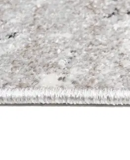 Moderní koberce Moderní béžový koberec s motivem jemných lístků