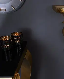 Designové a luxusní konzolové stolky Estila Luxusní antická nástěnná konzola Persephone ve zlatém provedení z kovu s ozdobnou konstrukcí 25cm