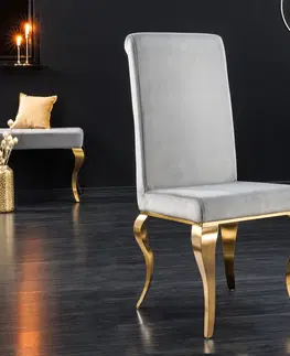 Luxusní jídelní židle Estila Designová jídelní židle Modern Barock se zlatým kovovým nohama a stříbrným potahem 104cm