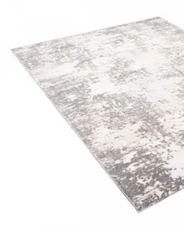 Moderní koberce Krémový designový koberec s šedým abstraktním vzorem Šířka: 120 cm | Délka: 170 cm