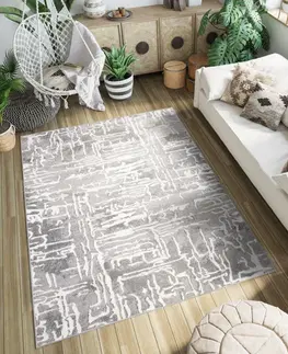 Moderní koberce Šedý designový koberec se světlým abstraktním vzorem Šířka: 140 cm | Délka: 200 cm