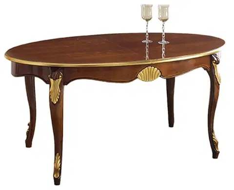 Designové a luxusní jídelní stoly Estila Luxusní rustikální oválný jídelní stůl Pasiones z vyřezávaného masivu s kovovou výzdobou 170 cm