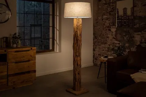 Designové a luxusní stojící lampy Estila Dřevěná Etno stojící lampa Adelise z teakového dřeva s šedým lněným stínítkem 134cm