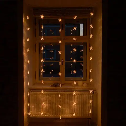Závěsy a sítě DecoLED Vánoční osvětlení do okna, propojovatelné, hvězdy, 1,2x2m, teple bílá, 50 diod