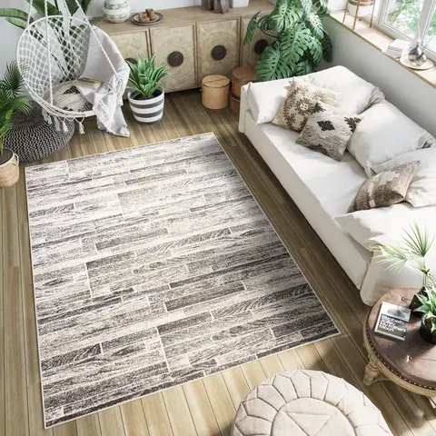 Moderní koberce Všestranný moderní koberec v hnědých odstínech