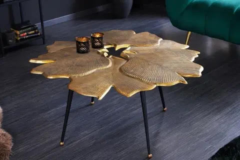 Designové a luxusní konferenční stolky Estila Art deco konferenční stolek Ginko zlaté barvy ve tvaru listů s černými nožičkami z kovu 90cm
