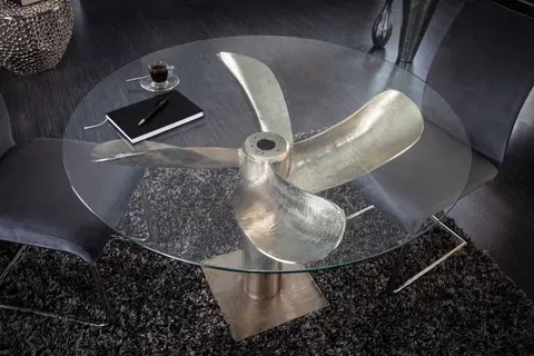 Designové a luxusní jídelní stoly Estila Kulatý jídelní stůl z kovu a skla ve tvaru lodního šroubu ve stříbrném provedení s kulatou deskou ze skla 94cm